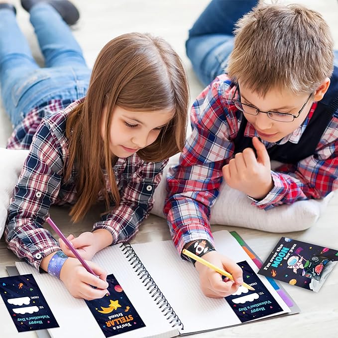 ANGOLIO 28Pcs Outer Space Theme Slap Bracelets with 28Pcs Valentine's Day Greeting Cards, Astronauts Planets Solar System Party Decoration Supplies Valentine Classroom Exchange Gift for Kids